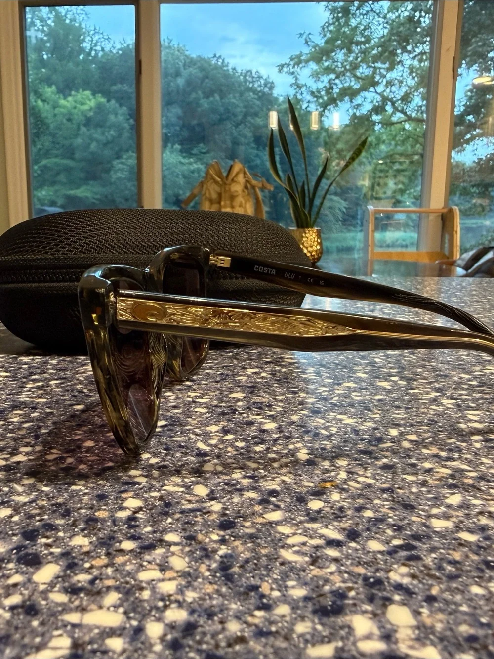 Costa Women’s Black Sunglasses with Purple-Tinted Lenses